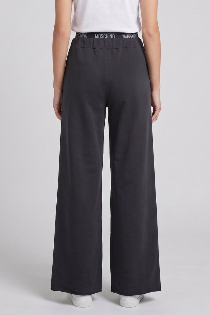 Moschino pantapalazzo in cotone stretch con elastico logato V6A6810-4436 [5b61f847]