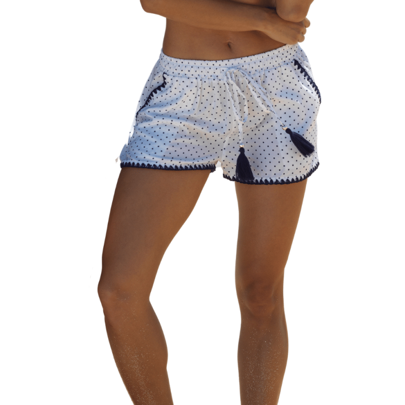 Pantaloncini copricostume bianchi pois